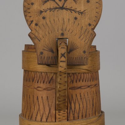 a wooden watering can from the Hutsul region