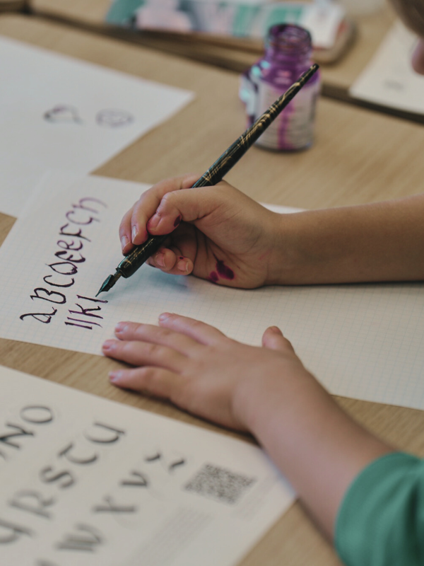 grafika z napisem warsztaty edukacyjne